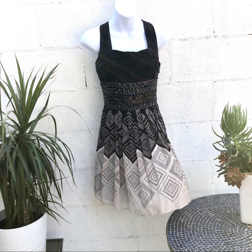 Bebe size medium silk with jeweled waistline dress